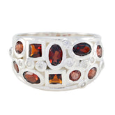 Laura modern red gemstone ring with multiple red stones set in silver band