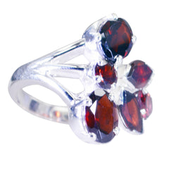 Lorena modern red gemstone ring with multiple deep red stones set in silver band