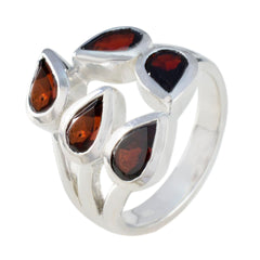 Natcha modern red gemstone ring with five teardrop-shaped red stones set in silver band