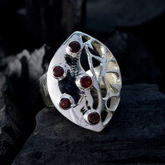 Mila modern red gemstone ring with silver intricate leaf design and five red stones