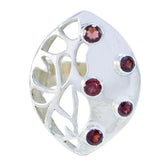 Mila modern red gemstone ring with silver openwork design and five red gemstones
