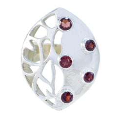 Mila modern red gemstone ring with silver openwork design and five red gemstones
