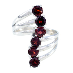 Rosa modern red gemstone ring with six round red stones set in a split silver band
