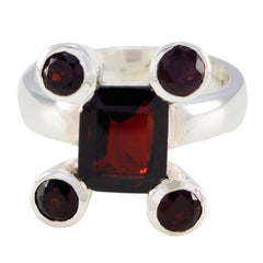 Siti modern red gemstone ring with square center stone and four round accent stones in silver setting