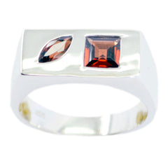 Lorena modern red gemstone ring with rectangular and marquise red stones in silver band