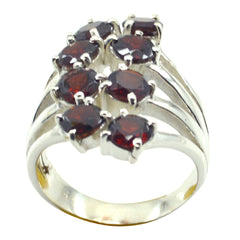Maria modern red gemstone ring featuring multiple red stones set in silver band design