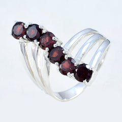 Rosa modern red gemstone ring with six deep red stones set in a silver split band design