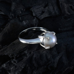 Isla modern solitaire ring with a single pearl set on a sleek silver band