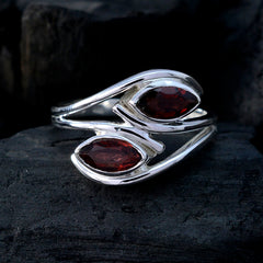 Milagros modern toi et moi ring featuring two marquise red gemstones set in polished silver band