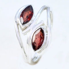 Milagros modern toi et moi ring with two marquise red gemstones set in silver band