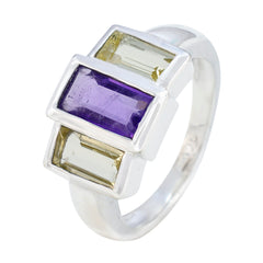 Emily modern trilogy ring with rectangular amethyst and two light green gemstones in silver setting
