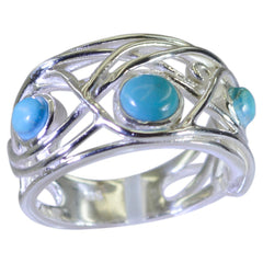 Layla modern turquoise trilogy ring with silver intricate openwork design and three turquoise stones