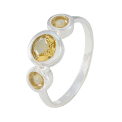 Lili modern yellow gemstone ring featuring three round yellow stones set in silver band