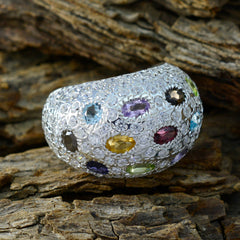 Penelope multicolor cocktail ring for women domed silver pave band with oval multicolored gemstones on wood
