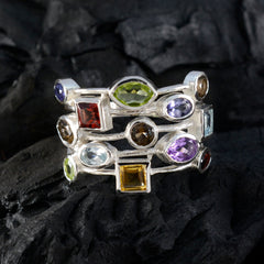Isadora multicolor cocktail ring with various colorful gemstones set in silver bands