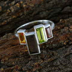 Carla multicolor cocktail ring with rectangular yellow, black, green, and red stones on silver band