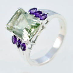 Layla multicolor cocktail ring with large green center stone and purple accent stones in silver setting
