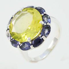 Lily multicolor cocktail ring featuring a large yellow center stone surrounded by smaller purple gemstones