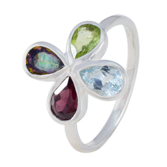 Nova multicolor floral gemstone ring with teardrop-shaped green, blue, red, and purple stones on silver band