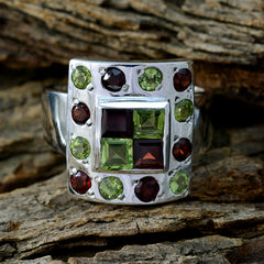 Harper multicolor gemstone cocktail ring with square center cluster of green and red stones on silver band