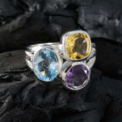 Saanvi multicolor gemstone cocktail ring with blue, yellow, and purple stones in silver setting