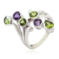 Nora multicolor gemstone cocktail ring featuring purple and green gemstones set in silver band