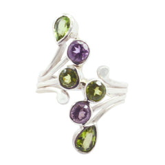 Nora multicolor gemstone cocktail ring with purple and green stones set in silver band