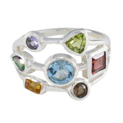 Charlotte multicolor gemstone cocktail ring with various shaped vibrant stones in silver band