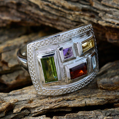 Ida multicolor gemstone cocktail ring with green, purple, red, and yellow stones set in silver