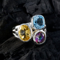 Priya multicolor gemstone cocktail ring with yellow, blue, and purple stones in silver setting