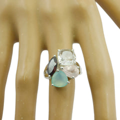 Yasmine multicolor gemstone cocktail ring with three unique stones on a display hand