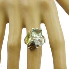Mariana multicolor gemstone cocktail ring on mannequin hand with green yellow and clear stones