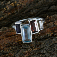 Dewi multicolor gemstone cocktail ring with rectangular blue, red, purple, and clear stones set in silver