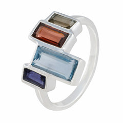 Dewi multicolor gemstone cocktail ring with rectangular blue, red, purple, and smoky stones set in silver band