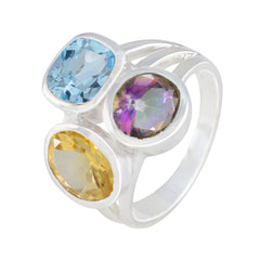 Priya multicolor gemstone cocktail ring with blue, purple, and yellow stones set in silver band