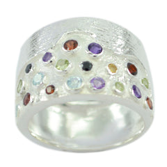 Micaela multicolor gemstone cocktail ring with various colorful stones set on wide silver band