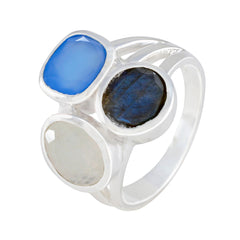 Constanza multicolor gemstone cocktail ring with blue, black, and white stones set in silver band