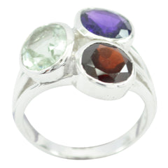 Gabriela multicolor gemstone cocktail ring with purple, green, and red stones set in silver band
