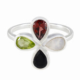 Dewi multicolor gemstone floral ring with red, green, white, and black teardrop stones set in silver band