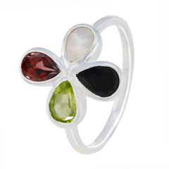 Dewi multicolor gemstone floral ring with red, white, black, and green teardrop stones in silver setting