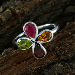 Lakshmi multicolor gemstone floral ring with red, yellow, green, and dark red stones on silver band