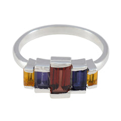 Rina multicolor gemstone ring for women with rectangular red center stone flanked by purple and yellow gems on silver band