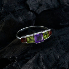 Autumn silver band ring with square amethyst peridot and garnet stones multicolor gemstone ring for women on dark rock