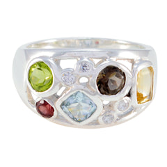 Isabelle multicolor gemstone ring with green, red, blue, yellow, and brown stones in silver setting