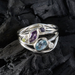 Joaquina multicolor gemstone ring with silver bands featuring amethyst blue topaz peridot and white stones