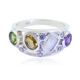 Ivy multicolor gemstone ring with green, yellow, purple, and clear stones set in silver band