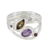 Ivana multicolor gemstone ring with silver band featuring purple, brown, red, and clear stones