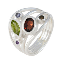 Meera multicolor gemstone ring with silver band featuring green, red, purple, and brown stones