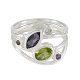 Liyana multicolor gemstone ring with silver band featuring purple, green, white, and brown stones