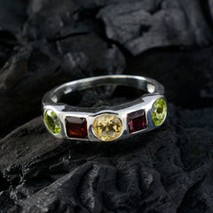 Emma sterling silver multicolor gemstone ring with peridot garnet and citrine stones on dark background